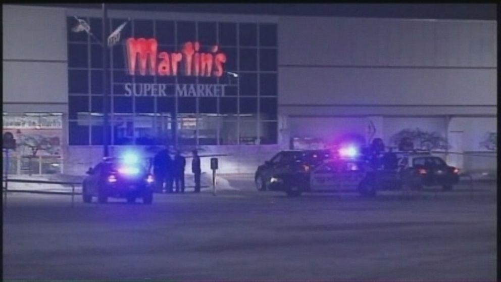 Three people, including a gunman, died in a shooting Wednesday, Jan. 15, 2014, at a grocery store in Elkhart, Ind. 