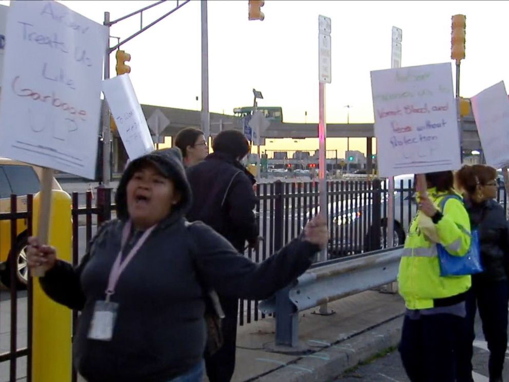 PHOTO: Air Serv cabin cleaners picketed outside New Yorks LaGuardia Airport, Oct. 9, 2014, striking over health and safety issues, including fears of possible exposure to Ebola.
