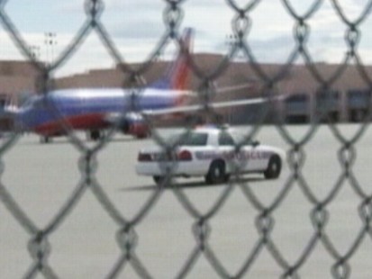 Video: Flight attendant takes baby away from alleged fighting parents.