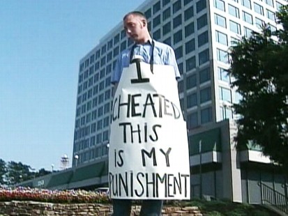 Video: Cheating husband focused to wear sign as punishment.