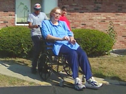 Picture of Sandy Allen in a wheelchair.