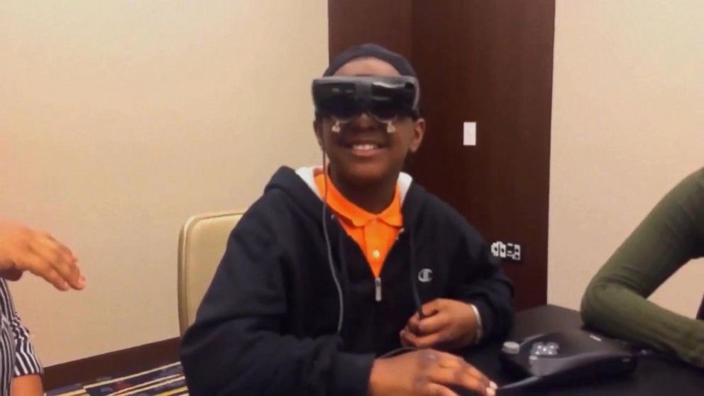 PHOTO: Virginia fifth-grader Chris Ward is legally blind but he recently got to see his mother Marquita Hackley for the first time while trying on new electronic glasses called eSight .