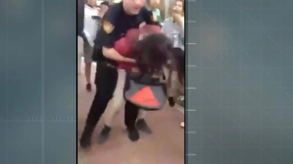 PHOTO: A shocking video appearing to show a school police officer body-slamming a young girl has prompted an investigation by the district.