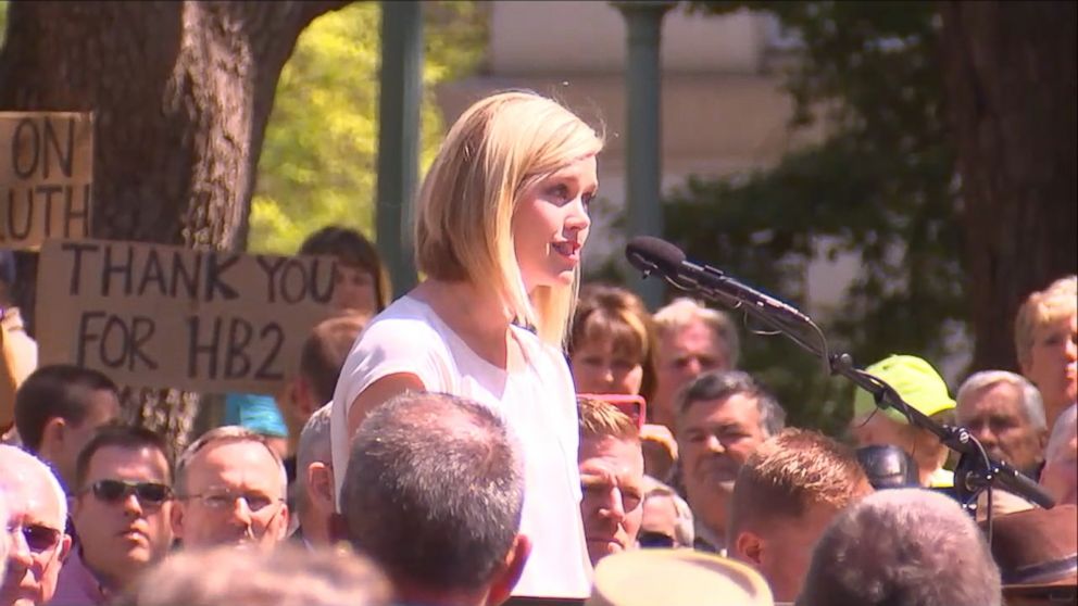 PHOTO: Kami Mueller of the North Carolina Values Coalition said to a cheering crowd she is thankful for the governor and the leaders of the state for "standing up," April 11, 2016. 