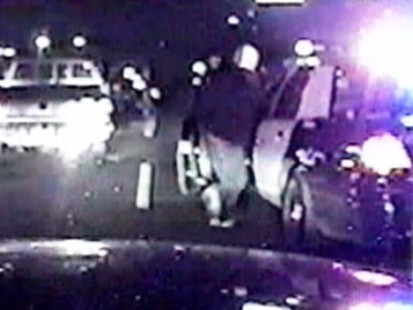 Video: Suspect caught on tape stealing police car.