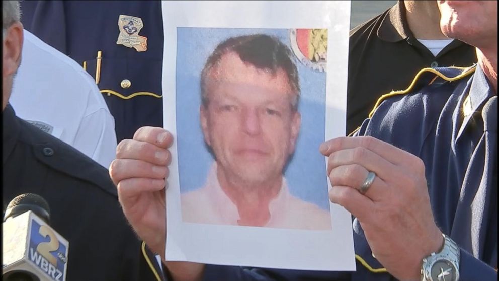 A photo of John Houser, who shot several people in a Lafayette movie theater on July 23, 2015, is shown during a press conference, July 24, 2015.