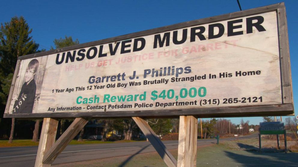 PHOTO: Unsolved murder sign for Garret Phillips in Potsdam, New York. 