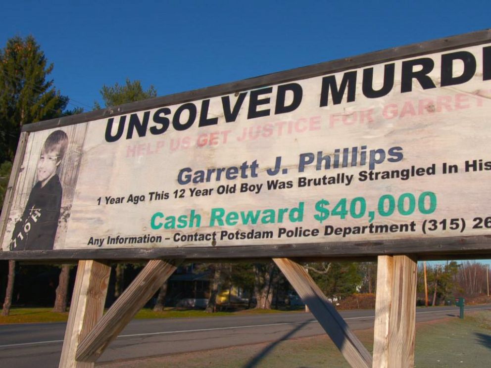 PHOTO: Unsolved murder sign for Garret Phillips in Potsdam, New York.