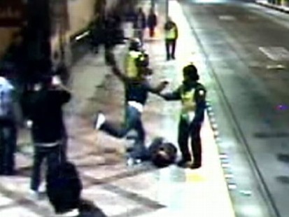 Guards watch as teen is beaten