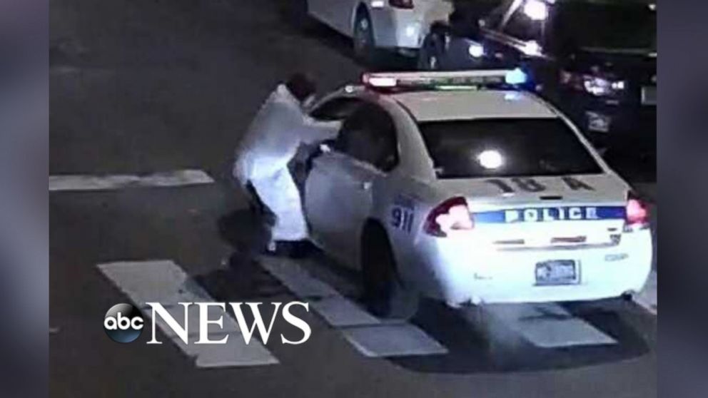 Officials say that suspected gunman Edward Archer fired at least 11 shots at Philadelphia police officer Jesse Hartnett while he was in his police vehicle.