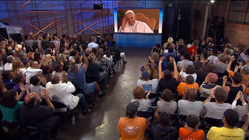 Pope Francis waves at the audience gathered for the event in Los Angeles on Aug. 31, 2015.