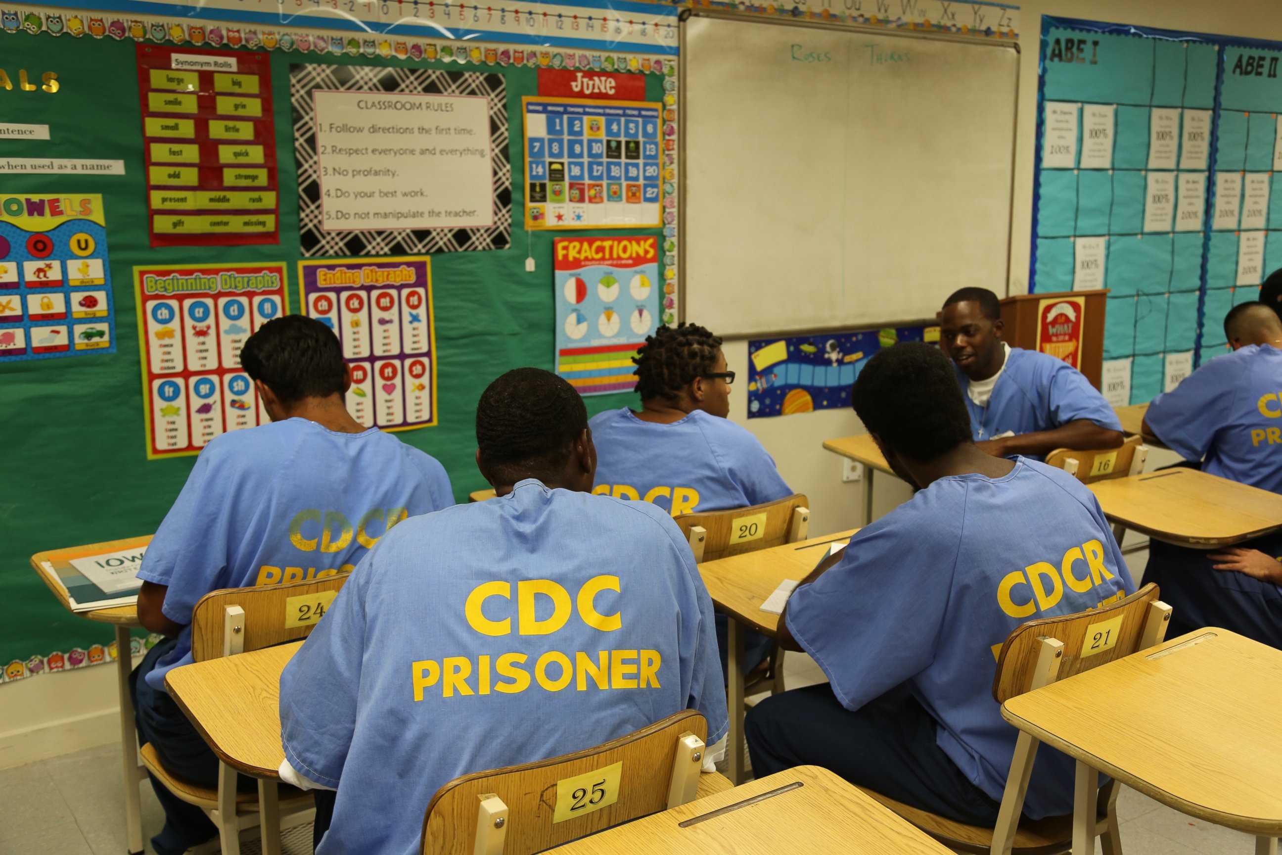 These inmates are participating in a creative writing class called "Inside Out Writers," a program that uses creative writing to educate and inspire positive prison behavior.