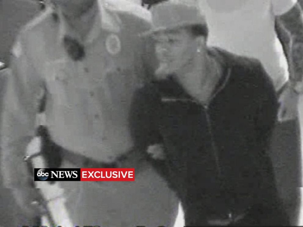 PHOTO: Video shows Ray Rice in handcuffs after he punched his wife in an Atlantic City elevator.