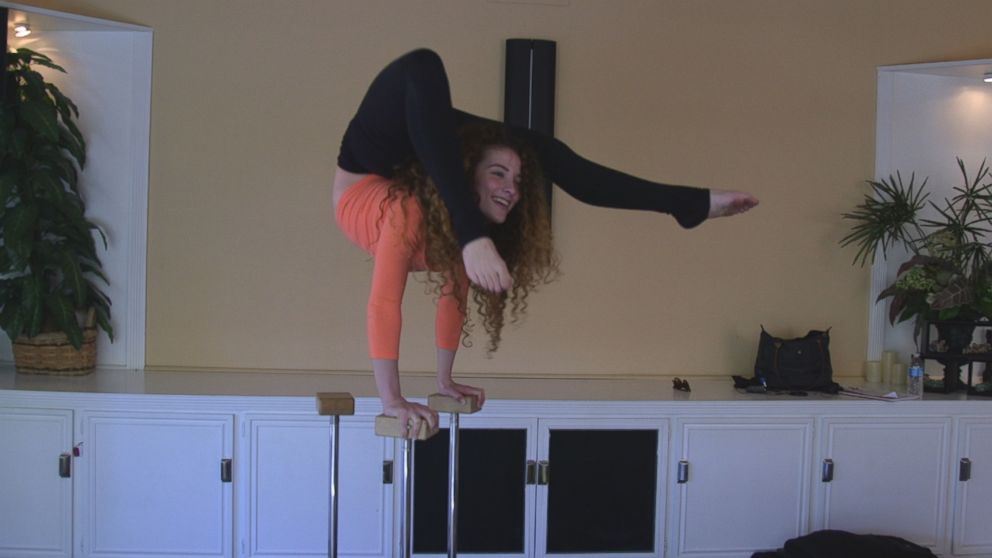 Contortionist Sofie Dossi is seen here practicing in her familys California home.