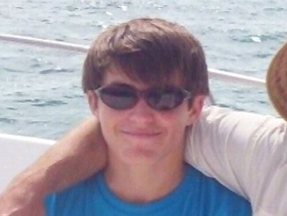 Video: Fla. teen bitten by 7-foot shark.
