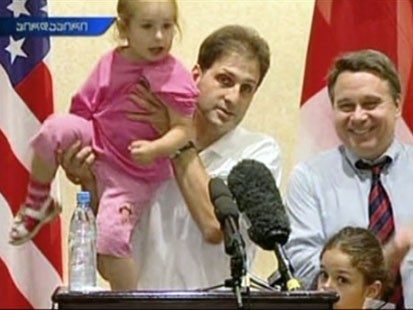 Picture of Joseph Evans and his daughters.