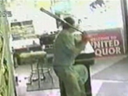 VIDEO: Richard Riley helps fight off a liquor store robber in Connecticut.