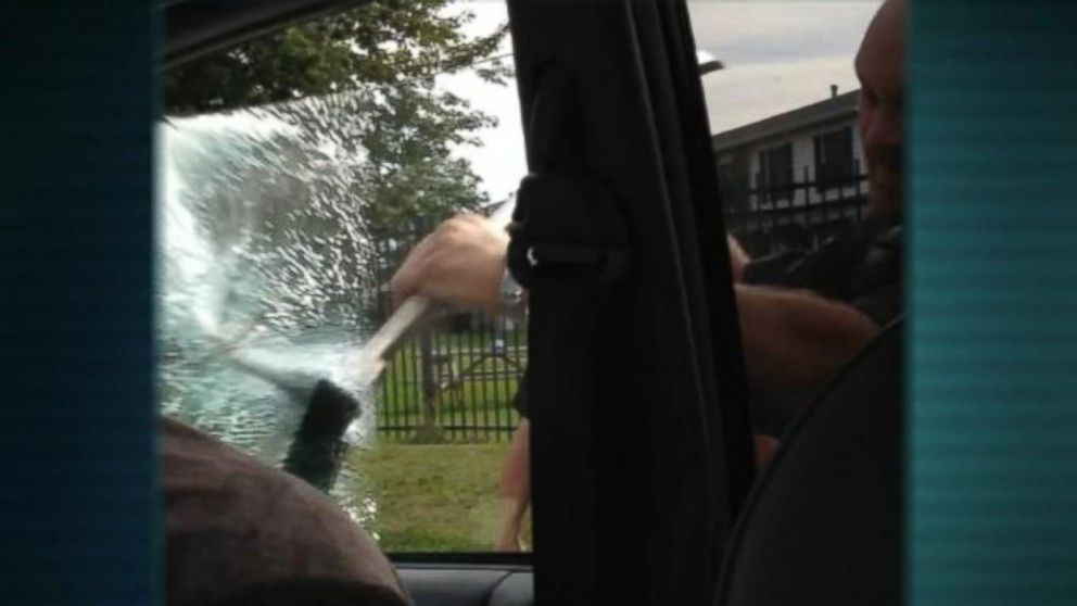 PHOTO: A grab from a video showing Jamal Jones being detained during a routine traffic stop. The family is suing the police department for excessive force after an officer smashed a car window. 