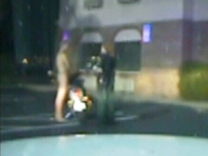 VIDEO: A man is arrested on DUI charges after riding naked on a motorcyle.