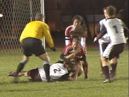 VIDEO: Fists fly on the field and in the stands at a high school soccer game in Rhode Island.