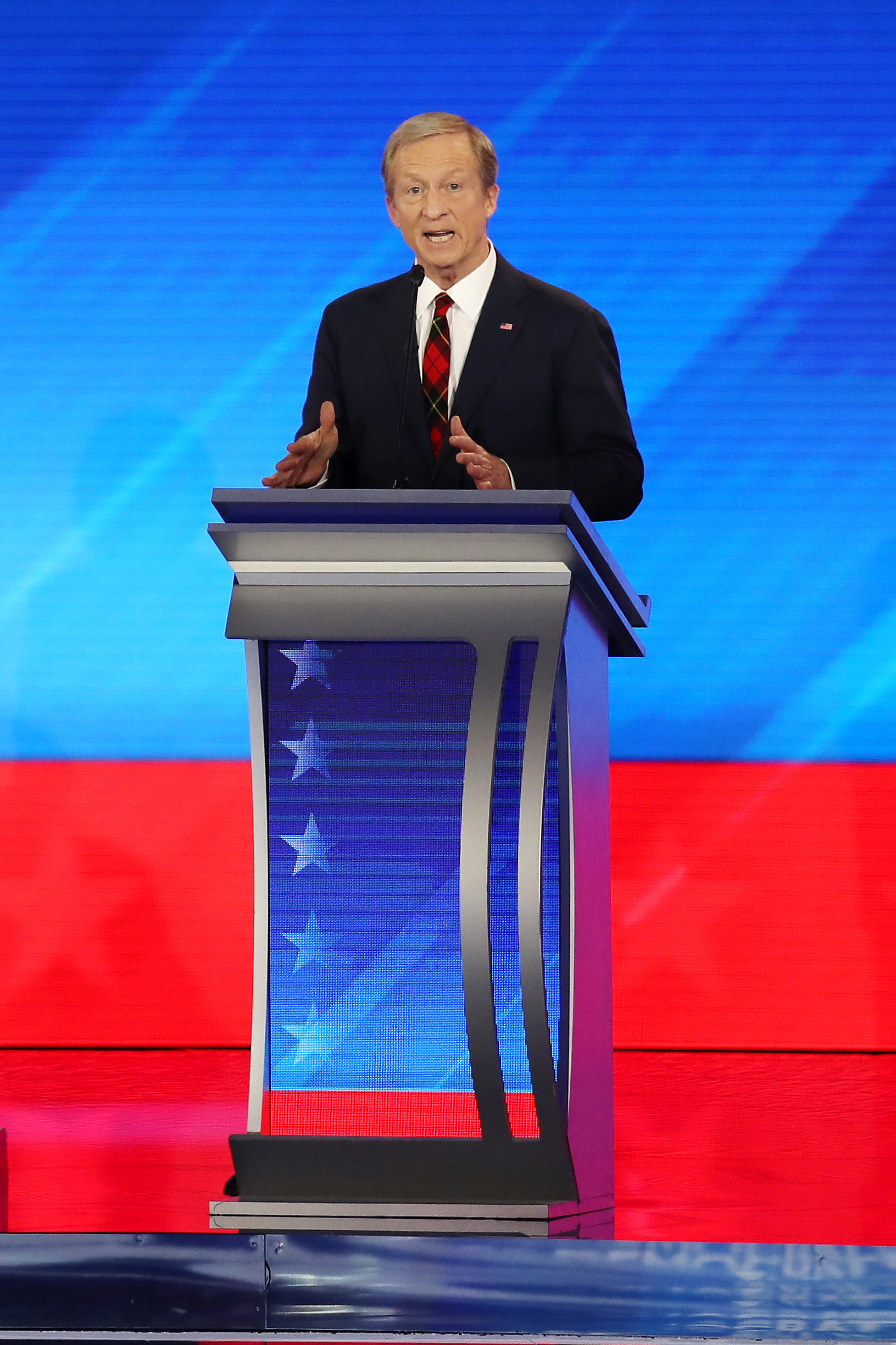 PHOTO: Democratic presidential candidate Tom Steyer participates in the Democratic presidential primary debate in the Sullivan Arena at St. Anselm College on February 07, 2020 in Manchester, New Hampshire.