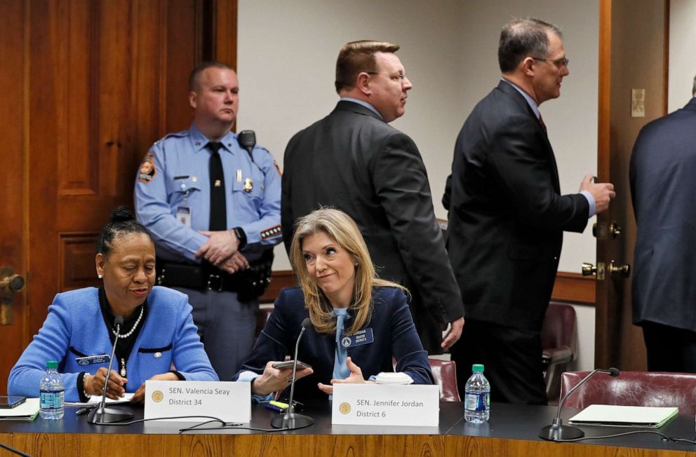 PHOTO: Sen. Valencia Seay, left, and Sen. Jennifer Jordan, right, remain seated for a moment after the passage of a bill that would ban most abortions once a fetal heartbeat can be detected, March 18, 2019, in Atlanta. 