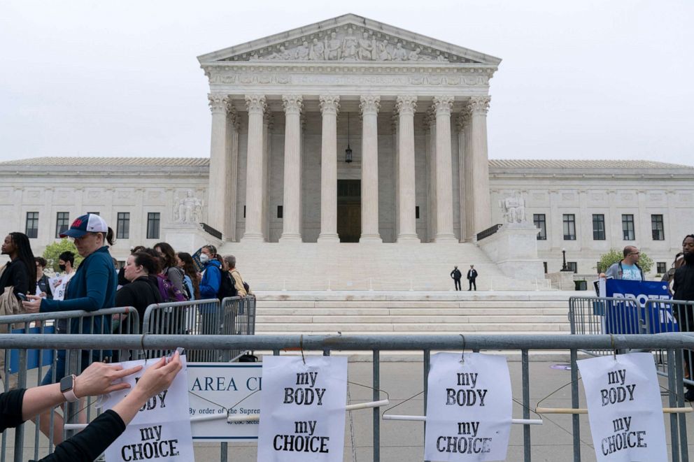 PHOTO: Demonstrators protest outside of the U.S. Supreme Court, on May 3, 2022, in Washington, D.C.