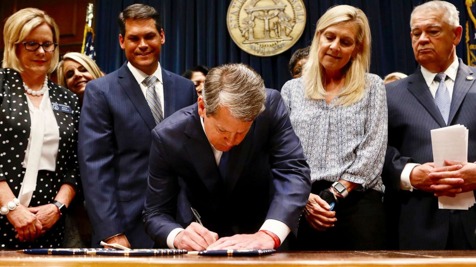 PHOTO: Georgia Gov. Brian Kemp signs legislation banning abortions once a fetal heartbeat can be detected, in Atlanta, May 7, 2019.