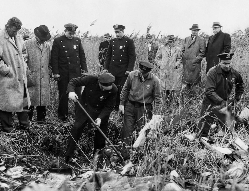 PHOTO: Police dig in a vacant wooded area in the Queens borough of New York to uncover the body of college student Arlene Thompson, 17, whose death was attributed to a bungled abortion attempt, Dec. 18, 1957.
