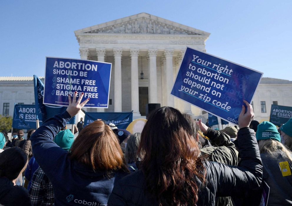 PHOTO: Abortion rights advocates and anti-abortion protesters demonstrate in front of the Supreme Court in Washington, on Dec. 1, 2021