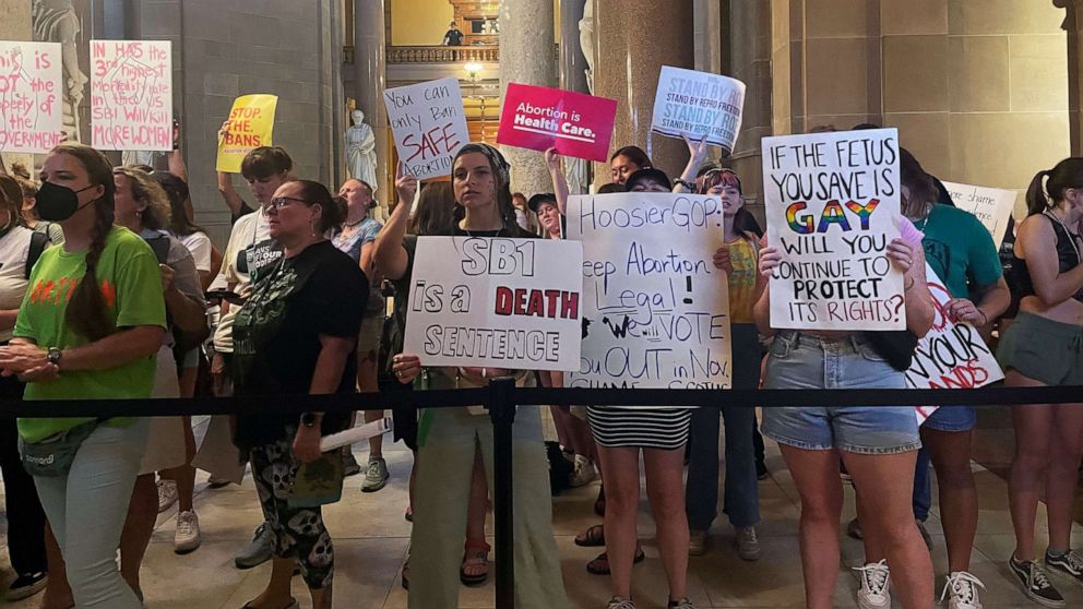 PHOTO: FILE - Abortion-rights protesters fill Indiana Statehouse corridors outside legislative chambers on Aug. 5, 2022, as lawmakers vote to concur on a near-total abortion ban, in Indianapolis.