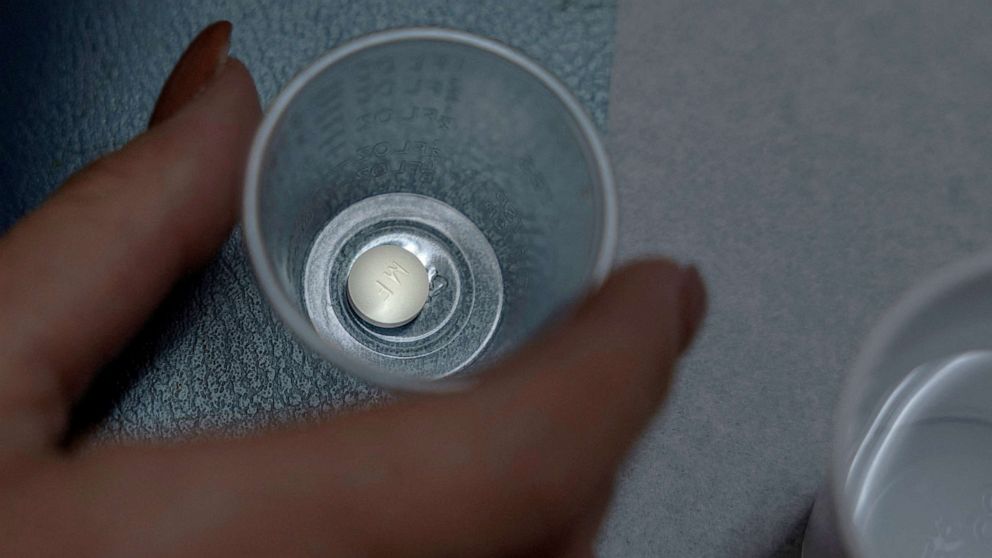 PHOTO: In this Jan. 13, 2023, file photo, a patient prepares to take mifepristone, the first pill given in a medical abortion, at a reproductive clinic in New Mexico.