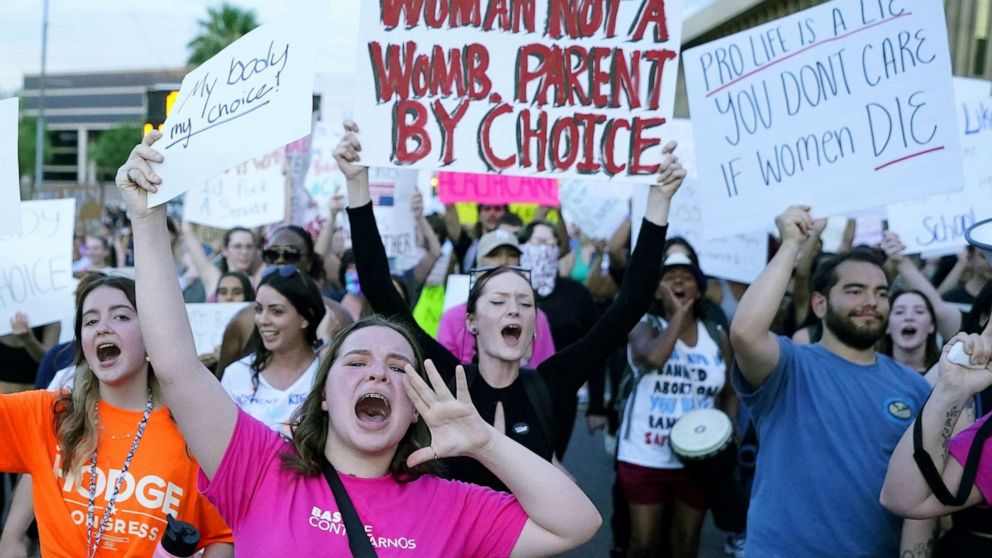 PHOTO: In this June 24, 2022, file photo, protesters in Phoenix shout as they join thousands marching around the Arizona state Capitol after the U.S. Supreme Court decision to overturn the landmark Roe v. Wade abortion decision.