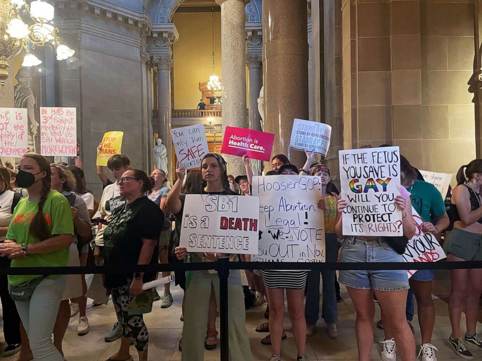 PHOTO: Abortion-rights protesters fill Indiana Statehouse corridors and cheer outside legislative chambers, Aug. 5, 2022, as lawmakers vote to concur on a near-total abortion ban, in Indianapolis.