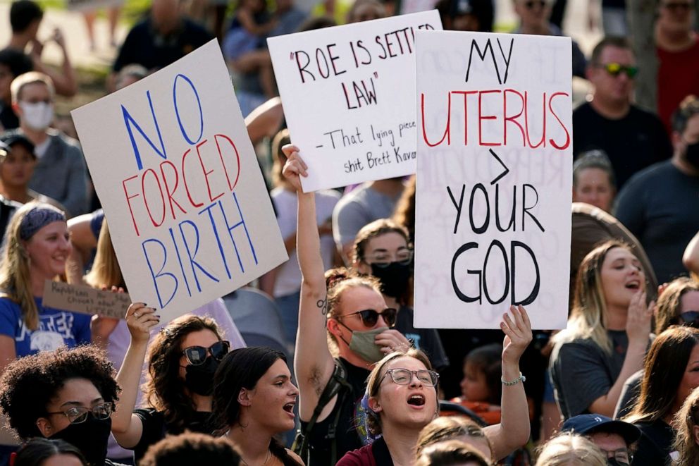 PHOTO: Abortion-rights protesters cheer at a rally, June 24, 2022, in Des Moines, Iowa.