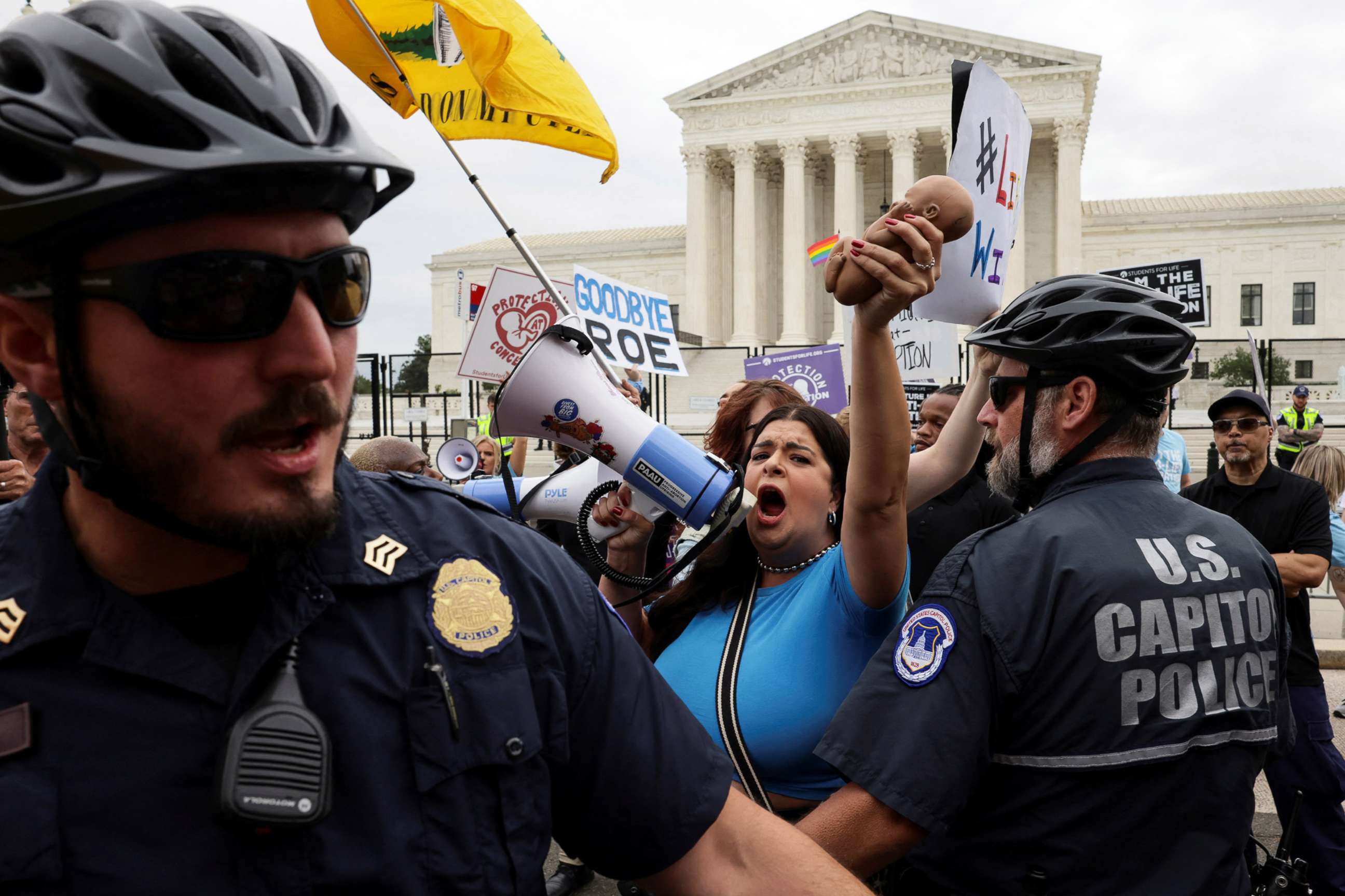 PHOTO: Police officers try to separate abortion rights supporters and anti-abortion protesters outside the United States Supreme Court in Washington, D.C., June 21, 2022.
