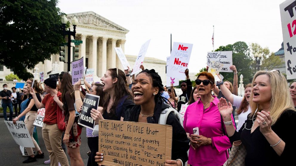 PHOTO: Abortion rights advocates yell at nearby anti-abortion advocates during protests outside the Supreme Court in Washington, D.C., on May 4, 2022.
