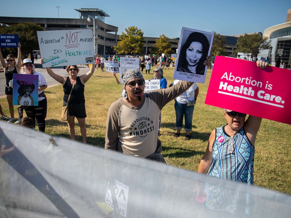 PHOTO: In this Oct. 8, 2022, file photo, abortion rights demonstrators chant and hold signs during a Womens March in Austin, Texas.