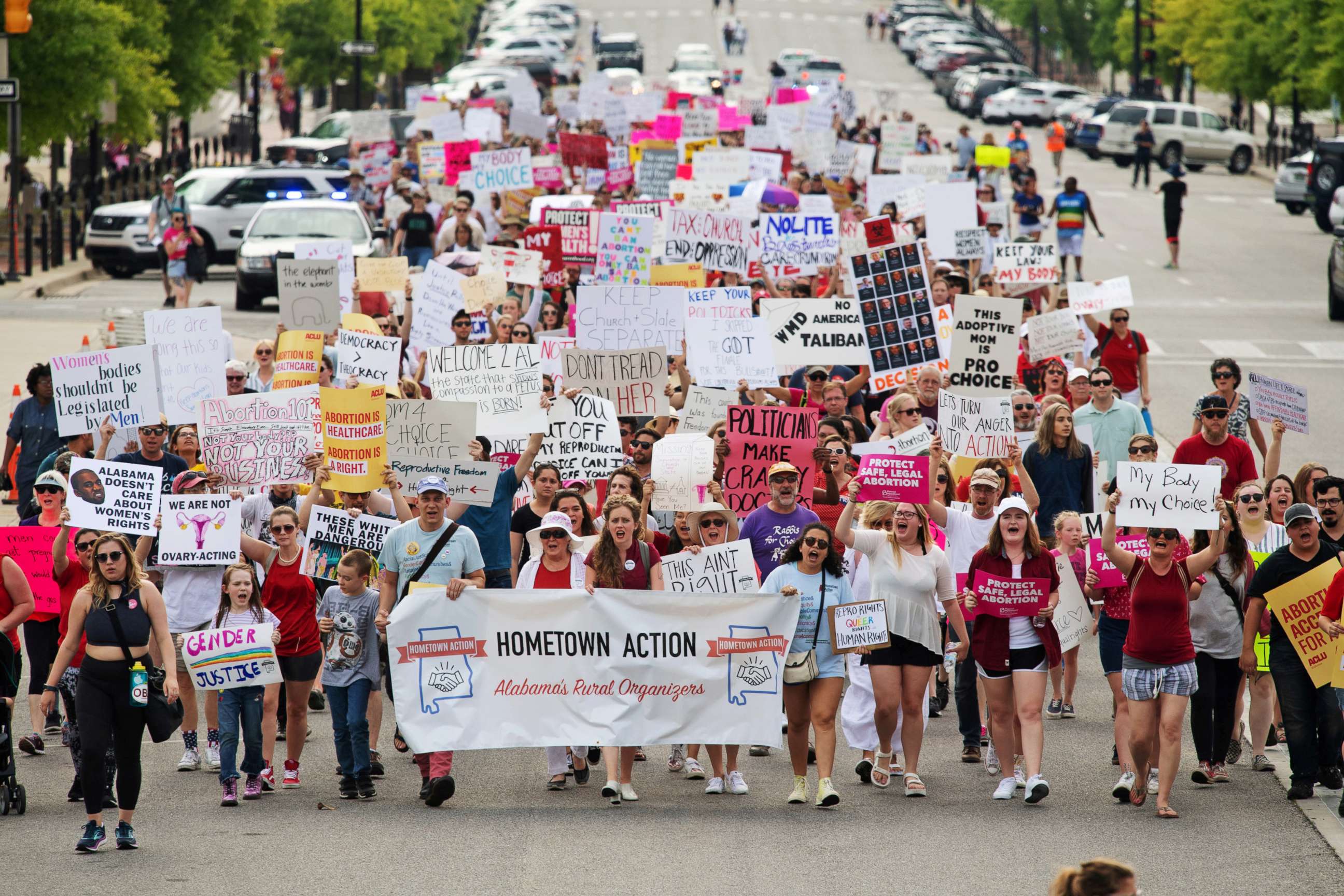 PHOTO: People walk to the Alabama State Capitol during the March for Reproductive Freedom against the state's new abortion law, the Alabama Human Life Protection Act, in Montgomery, Alabama, May 19, 2019.