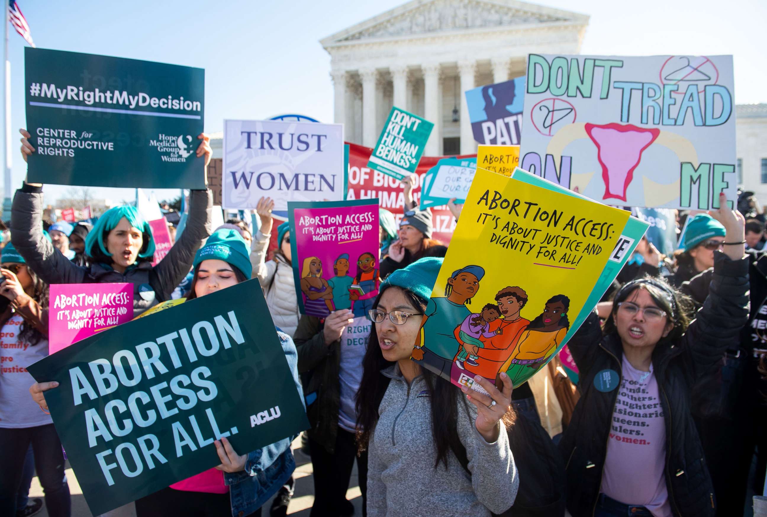 PHOTO: Pro-choice activists supporting legal access to abortion protest during a demonstration outside the US Supreme Court in Washington, DC, March 4, 2020.