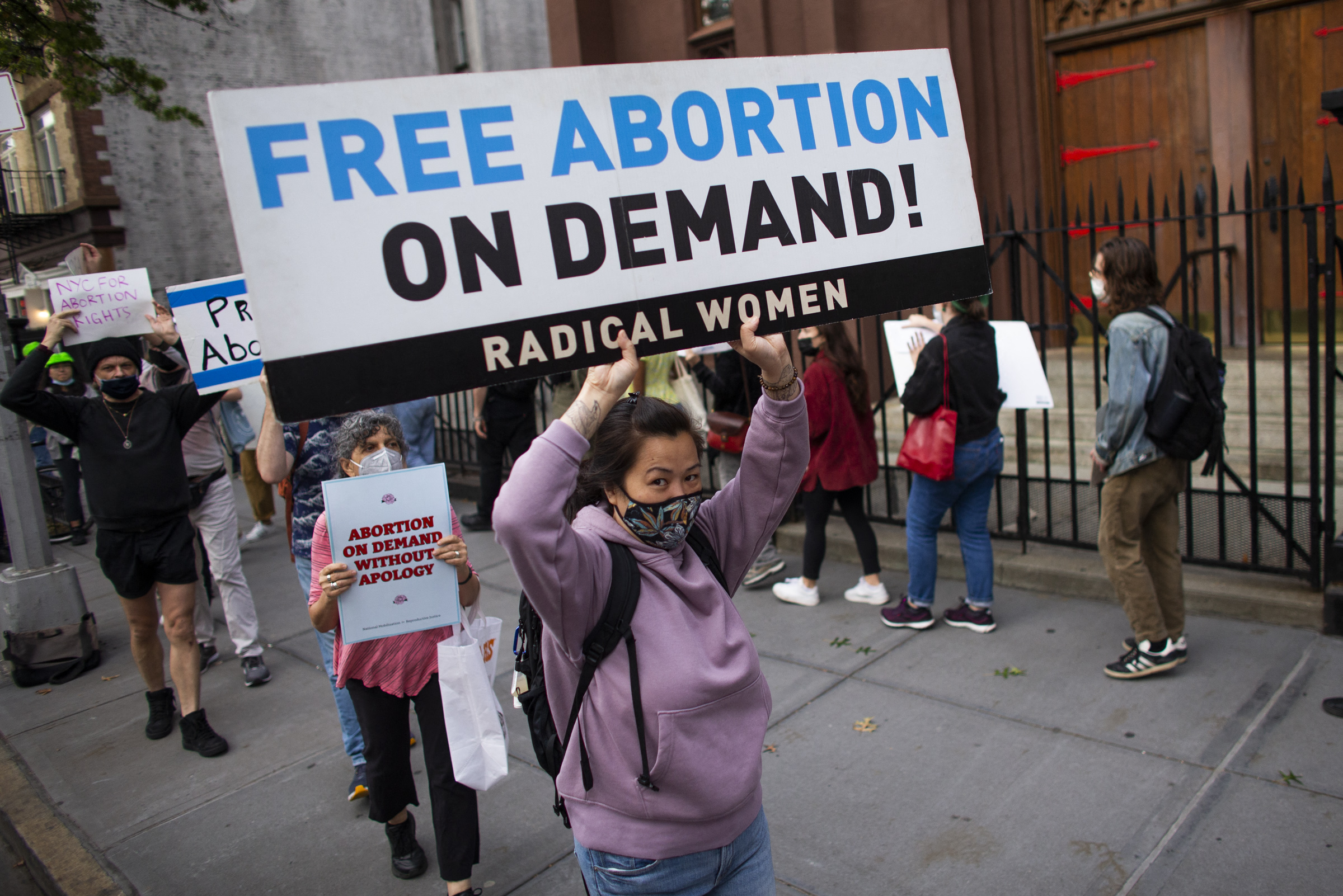 PHOTO: Protesters organized by NYC for abortion rights demonstrate outside Saint Pauls Roman Catholic Church in the Brooklyn Borough of New York City, on Oct. 9, 2021.