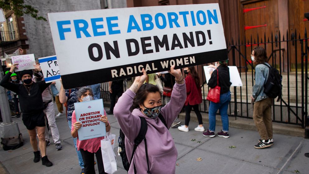 PHOTO: Protesters organized by NYC for abortion rights demonstrate outside Saint Pauls Roman Catholic Church in the Brooklyn Borough of New York City, on Oct. 9, 2021.