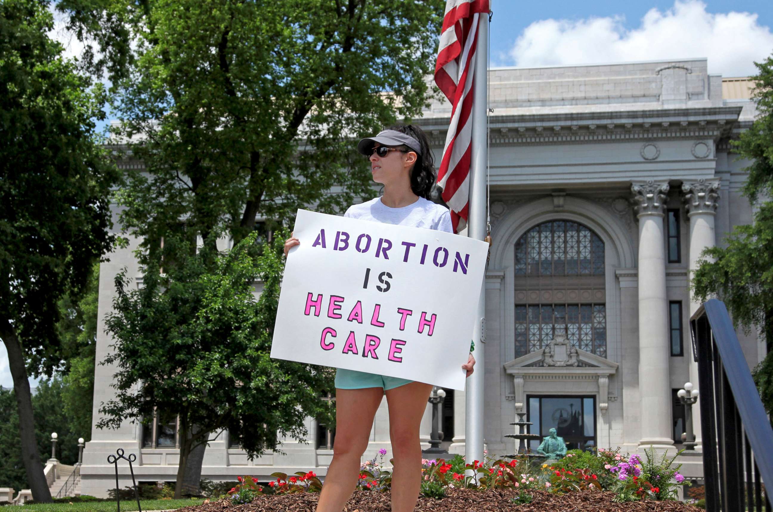 PHOTO: An abortion-rights demonstrator holds a sign in front of the Hamilton County Court House on May 14, 2022, in Chattanooga, Tenn.On June 28, a federal court  allowed Tennessee's ban on abortion as early as six weeks into pregnancy to take effect.
