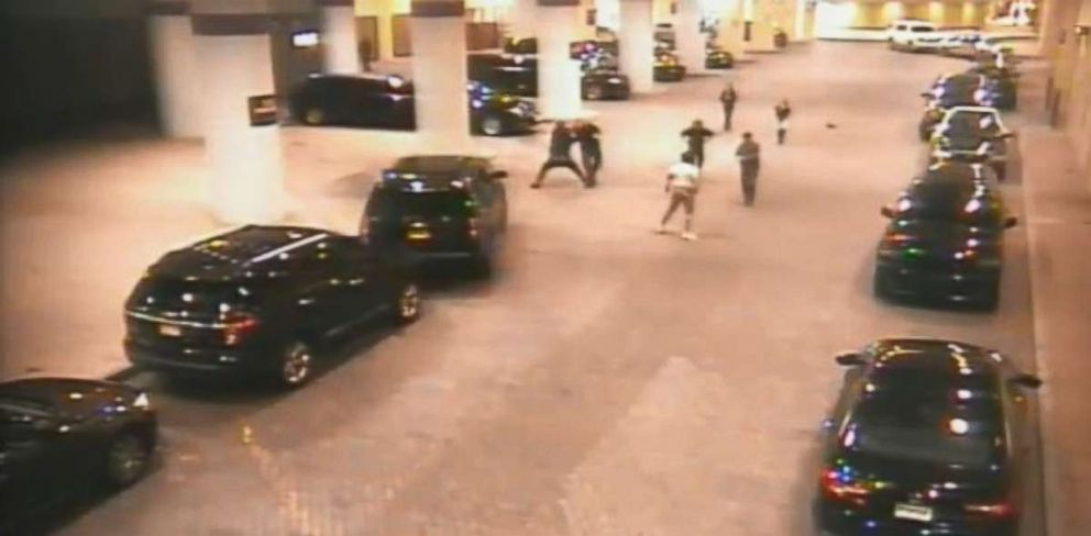 PHOTO: Atlantic City Mayor Frank Gilliam, center in gray suit, squares off in a fight against an unidentified man in a white T-shirt outside an Atlantic City casino on Nov. 11, 2018.