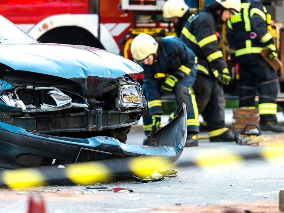 PHOTO: Firefighters attend to a car accident scene in this undated stock photo.