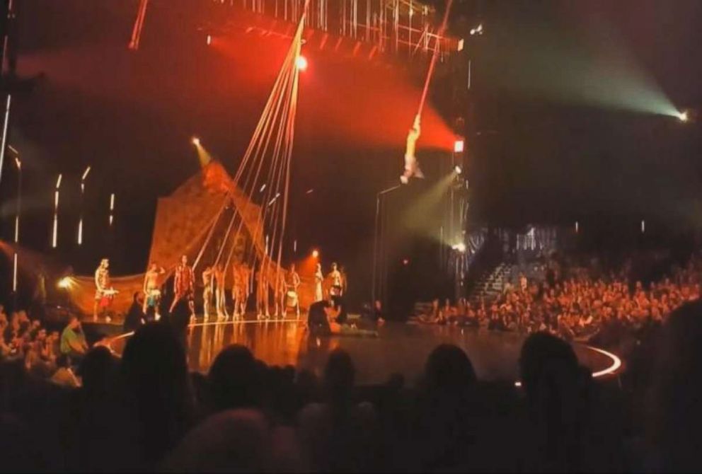 Doctors are seen tending to Yann Arnaud after he fell to the stage during Cirque du Soleil's performance of "Volta" on March 17, 2018.