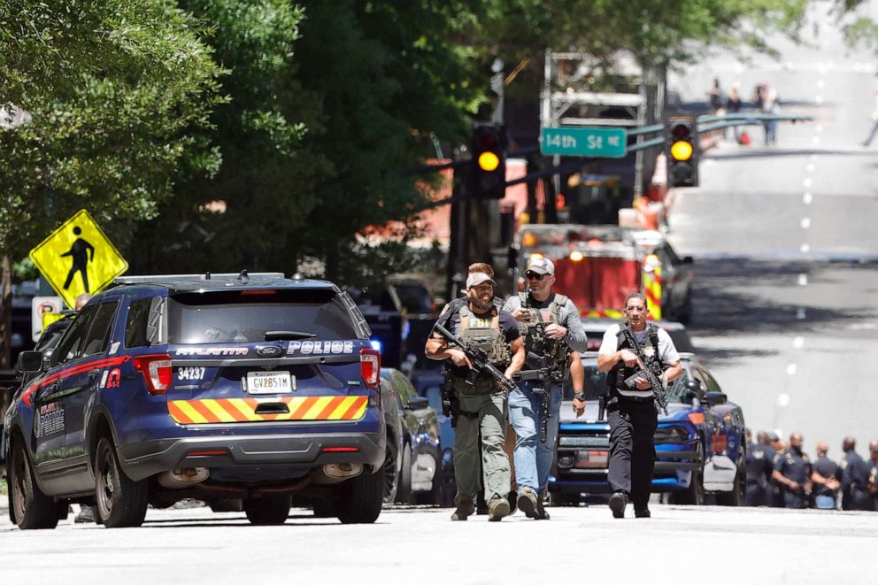 PHOTO: Law enforcement officers arrive near the scene of an active shooter, May 3, 2023 in Atlanta.