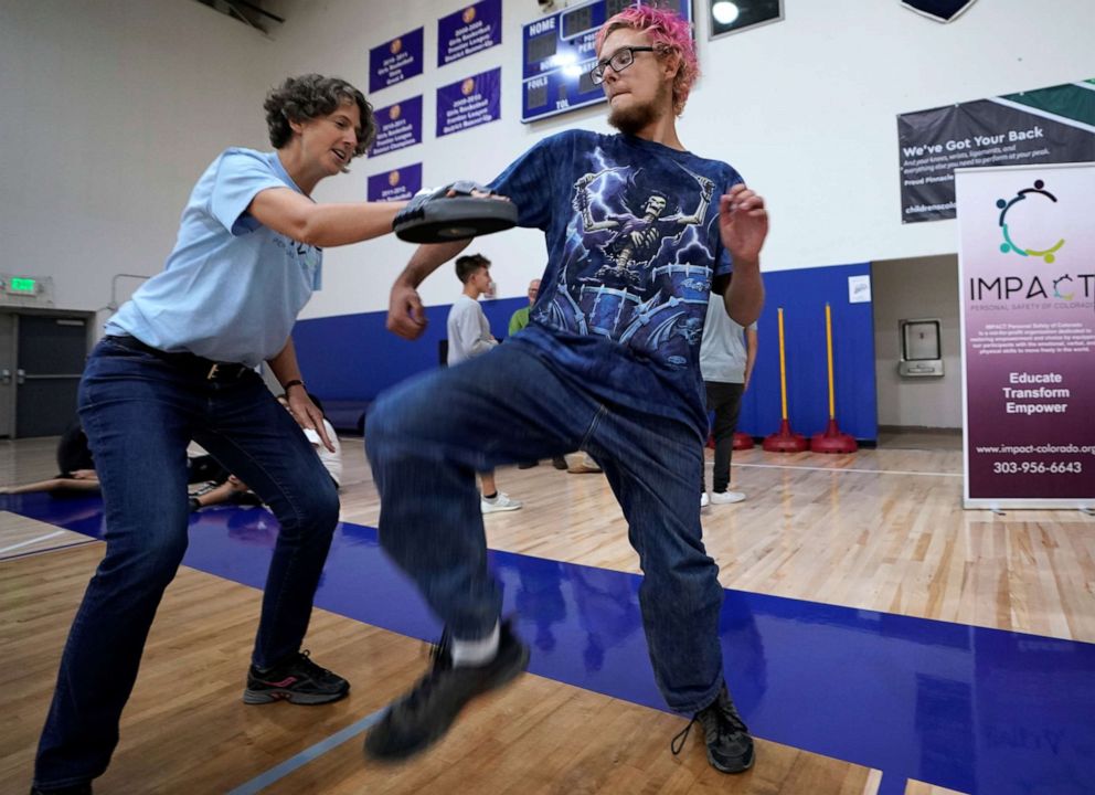 PHOTO: Pinnacle Charter School high school student Gregory Younce practices self-defense with trainer Alexis Halkovic during training for an active shooter situation in a school in Thornton, Colorado, Aug. 28, 2019.