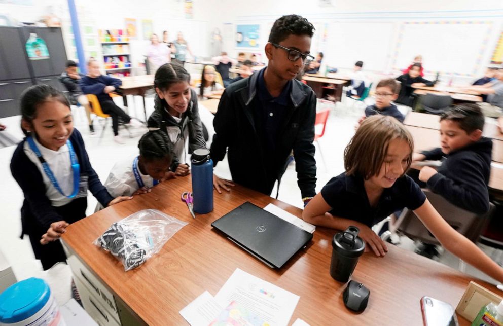 PHOTO: Fifth grade students move the teachers desk to blockade the classroom entrance door at Pinnacle Charter School during TAC*ONE training for an active shooter situation in a school in Thornton, Colorado, Aug. 29, 2019.