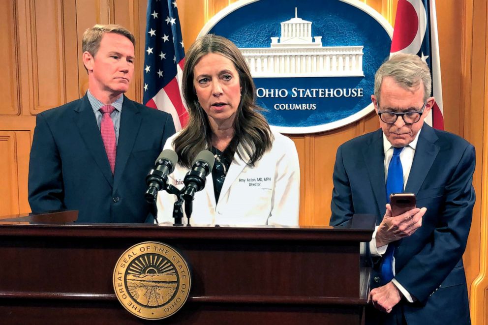 PHOTO: Dr. Amy Acton, Ohio Department of Health Director, center, discusses the confirmation of Ohio's first three cases of coronavirus.